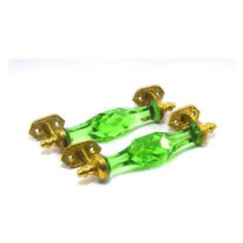 MCM crystal cut green glass on brass cabinet pullers or handles.